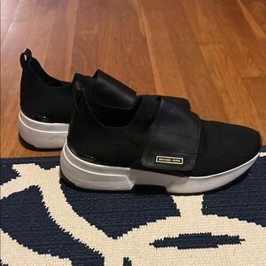 Michael Kors women’s Black and White Sneakers